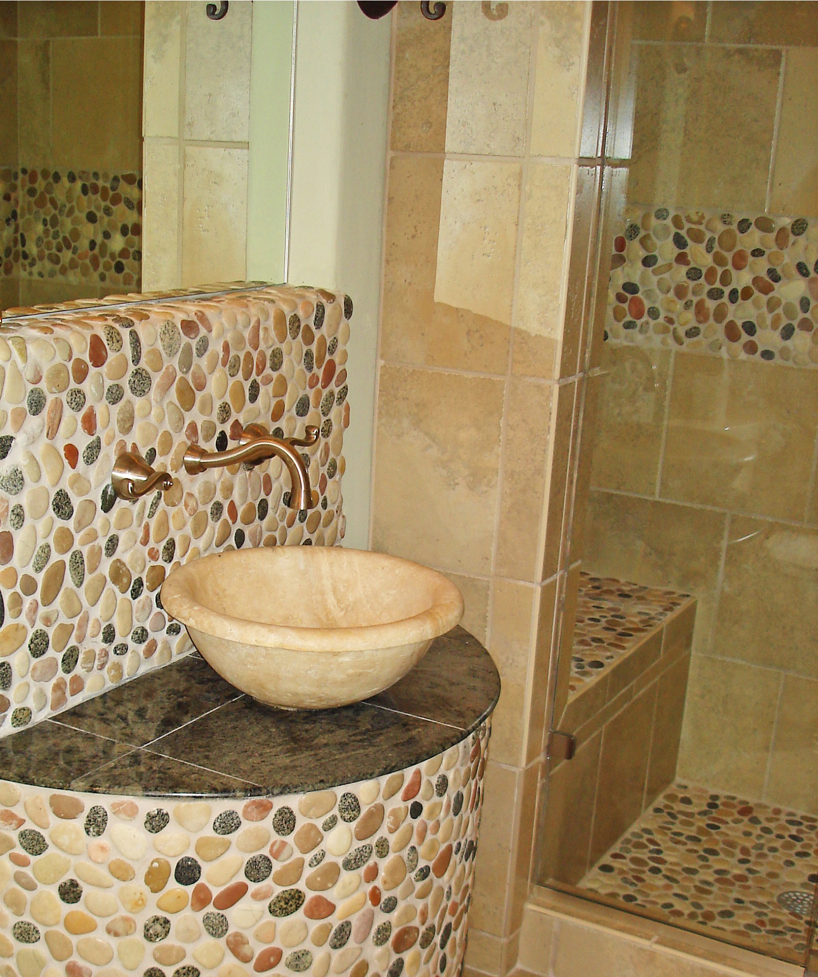 bathroom with colorful stone accent