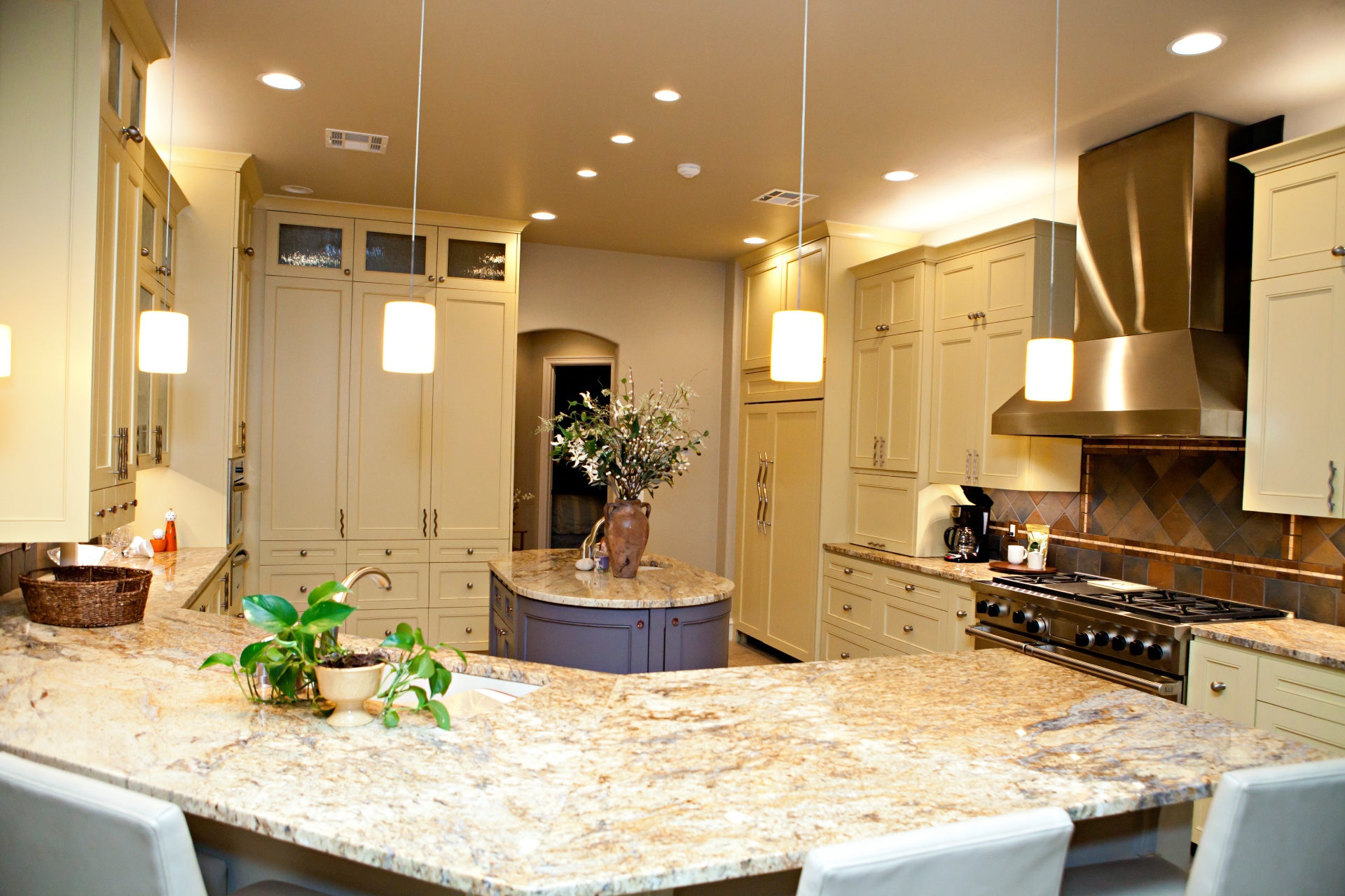 wide white-color and marble textured kitchen countertop